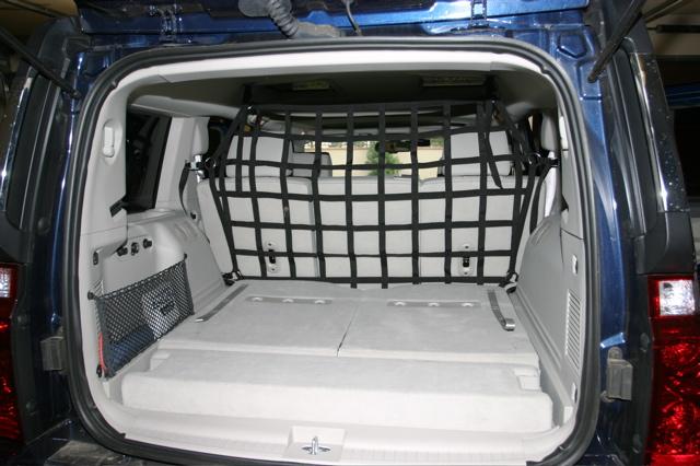 Dog barrier for jeep commander